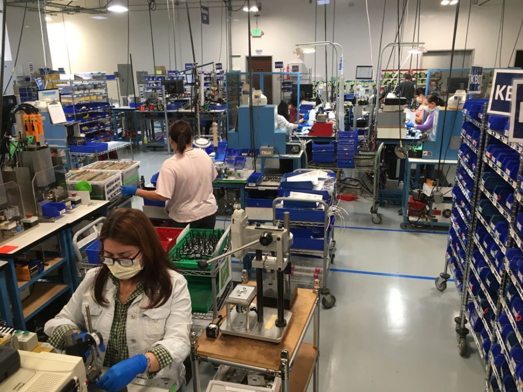 Employees of Lin Engineering in Morgan Hill, pictured on the company's design floor April 9, have remained busy as “essential” workers throughout the coronavirus crisis.